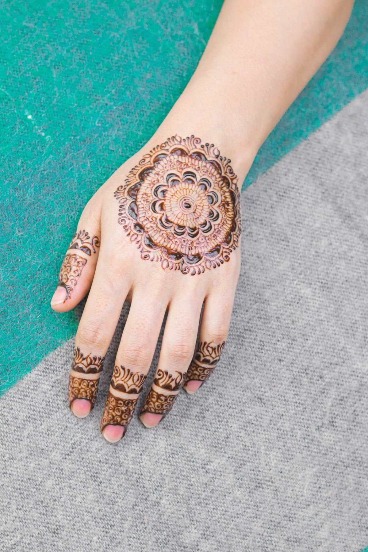 Mehndi being applied